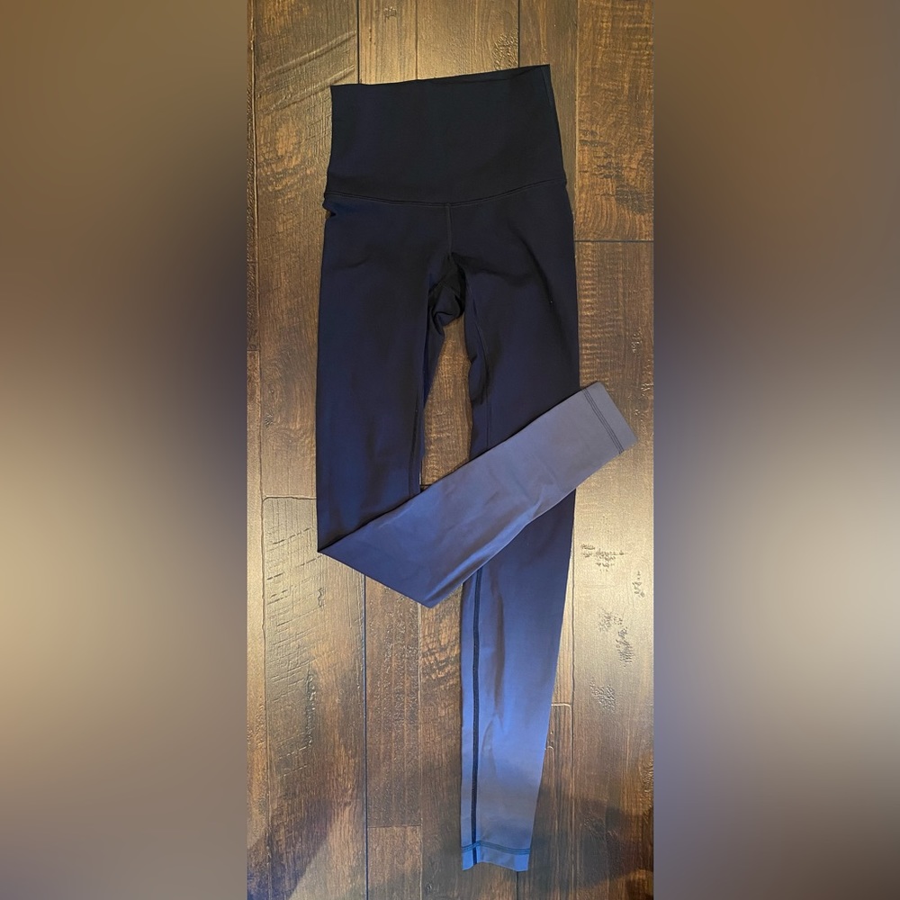 Lululemon “Wunder Under” high rise full length with dark to light fade.